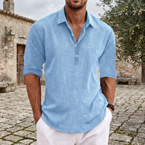 Caspian shirt worn in a stone courtyard, overcast morning